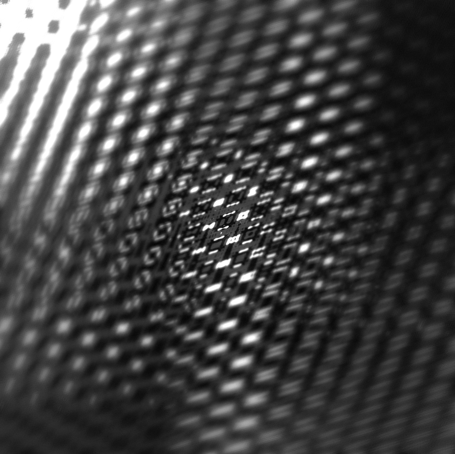 End of the year artwork: a blurred grid of black and white reflections