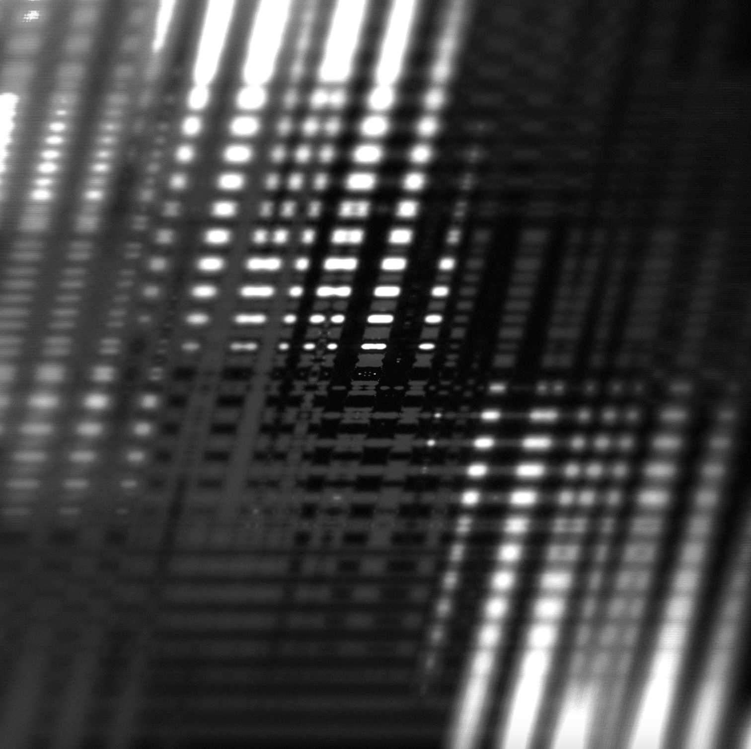 Outside artwork: intersecting bands of black and white light