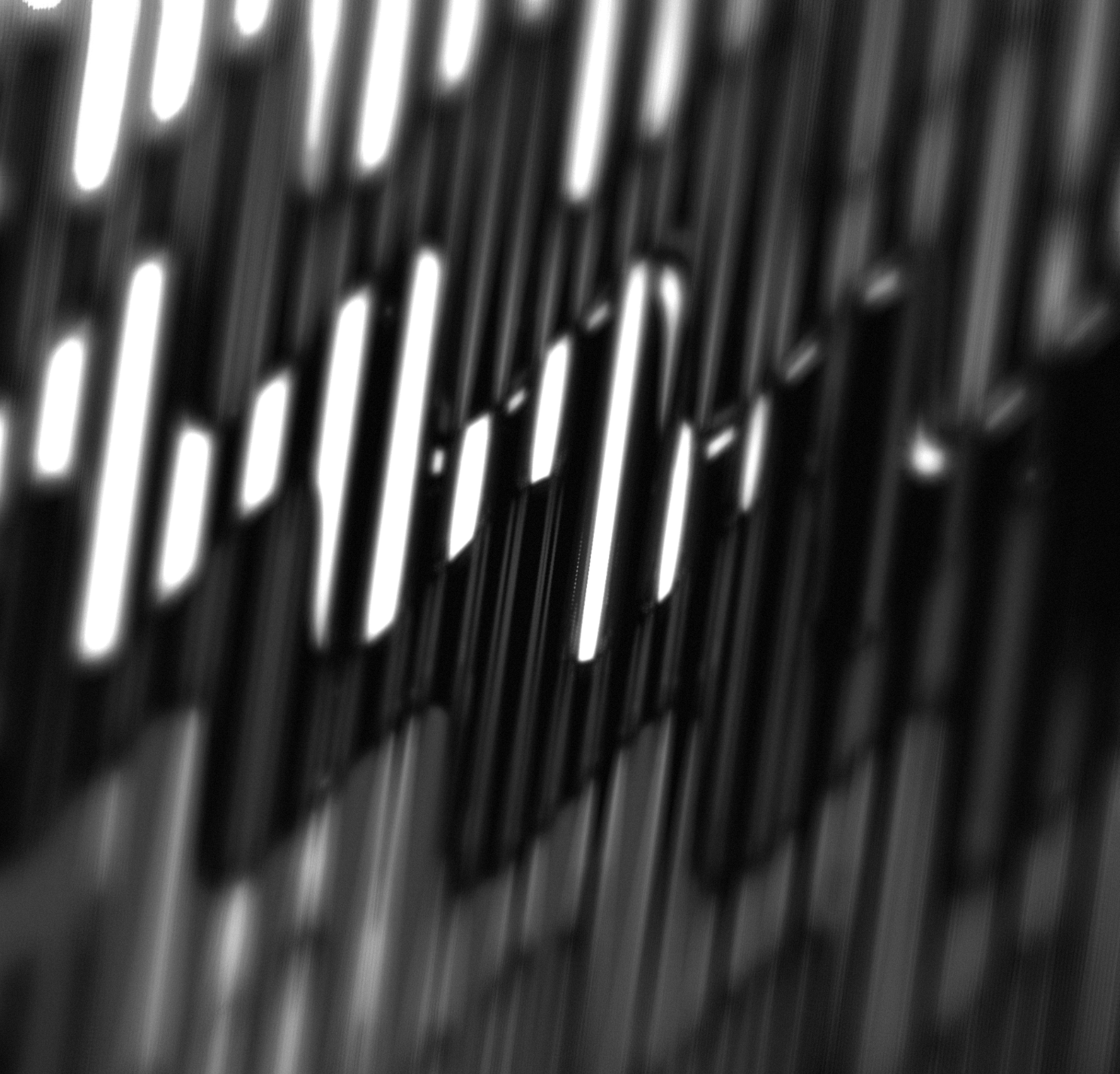 Oh artwork: vertical streaks of white light on black